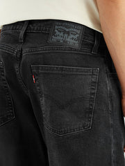 Levi's men's jeans with detailed close-up showing classic denim fabric and stitching, style 002IJ-0034.