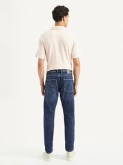 Back view of Levi's men's jeans 002IY-0000 in classic denim with visible stitching and pockets, showcasing casual men's lower wear.