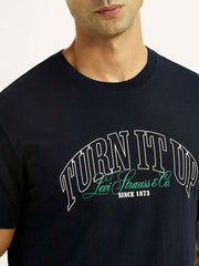 Men's navy slim fit T-shirt with typographic print, Levi's brand, short sleeve, casual upper wear, detailed close-up image.