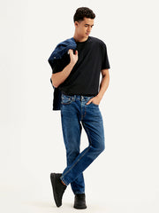 Levis men's jeans in style 18298-1582, showing a front view of the classic blue denim jeans on a model.