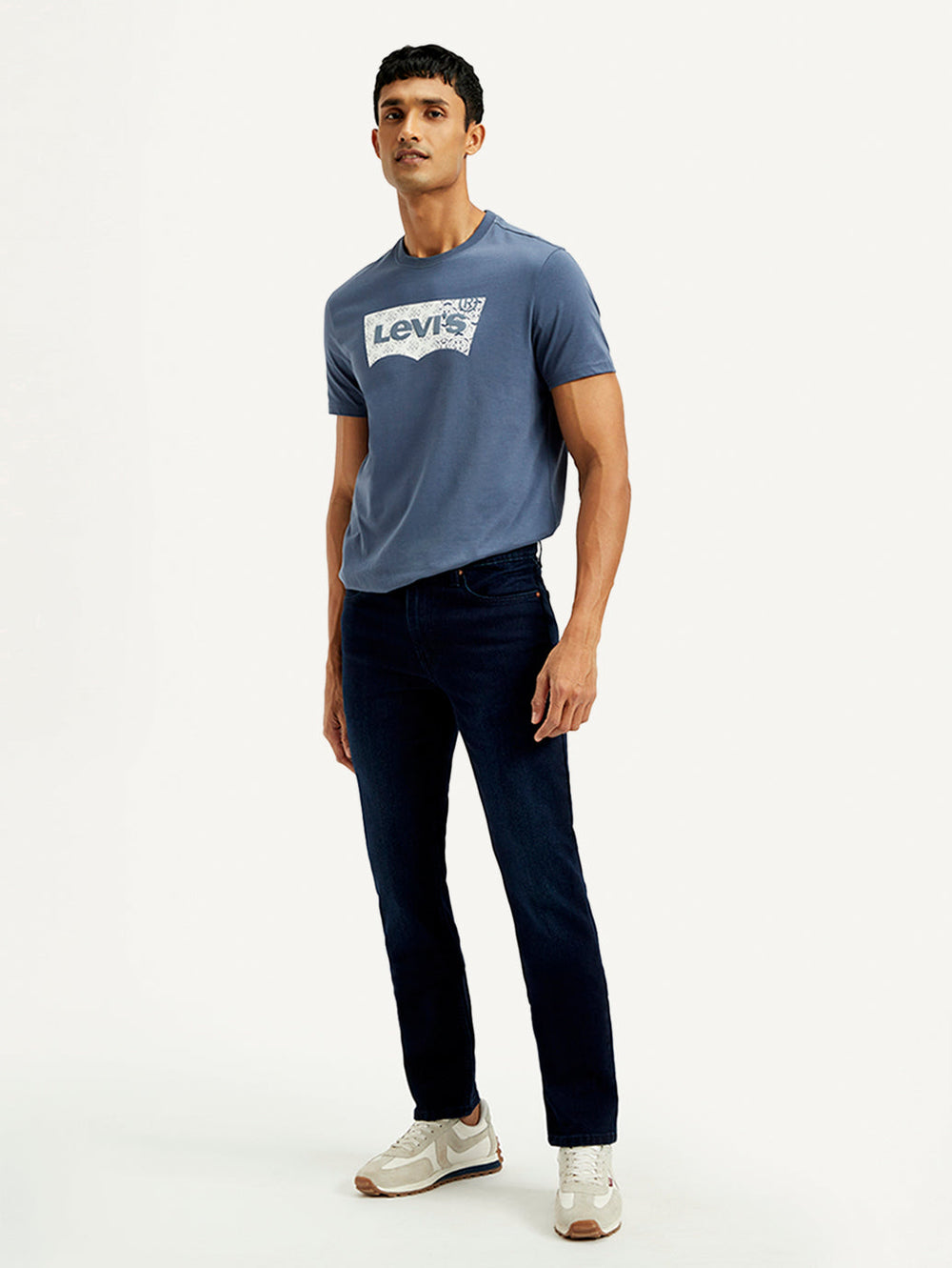 Levi's men's jeans in classic blue denim, front view showing fitted style and traditional five-pocket design.