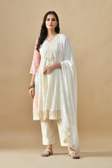 Cream Sabhyata ladies western kurti 3pcs set, featuring elegant design and comfortable fabric, displayed on a mannequin.