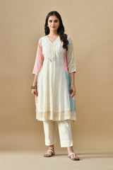 Cream Sabhyata ladies western kurti 3pcs set featuring elegant design and comfortable fabric, displayed on a model.