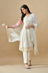Cream Sabhyata ladies western kurti 3pcs set featuring elegant design and comfortable fabric in a stylish arrangement.