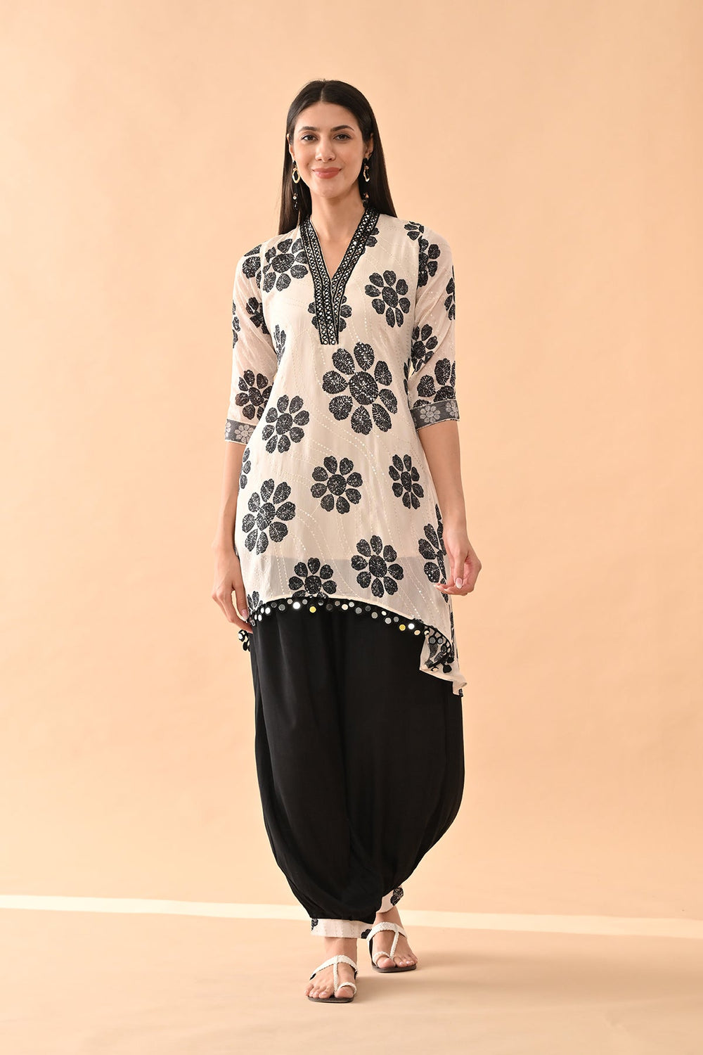 Cream Sabhyata ladies western kurti 2pcs set featuring a stylish design and elegant fabric drape.