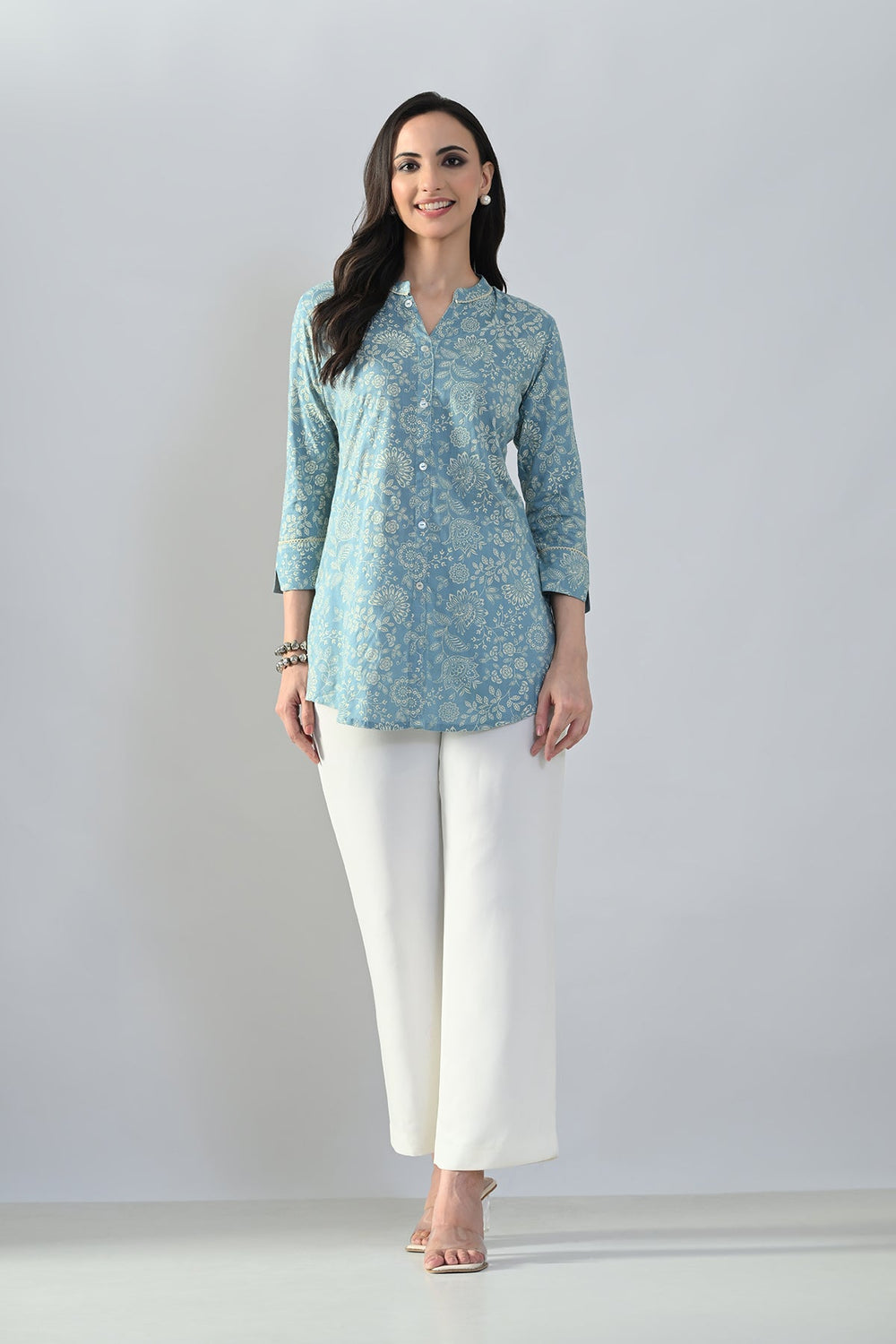 Green Sabhyata ladies western kurti, part of a 3-piece set, with intricate design and comfortable fabric, styled for modern women.