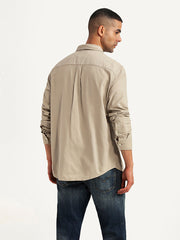 Levis men's casual shirt in navy blue, back view showing button-down collar and relaxed fit, made from comfortable fabric.