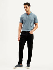 Levis men's jeans 36087-1021 in classic blue denim, shown on a model with a relaxed fit and visible stitching details.