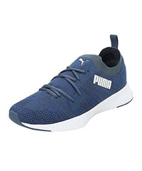Puma Flyer Runner Engineered Knit men's sneaker in dark denim, palace blue, and white with mesh upper and rubber sole.