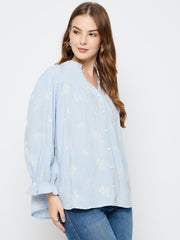 Powder blue Madame ladies Western top with long sleeves and Western-inspired design, suitable for casual and western wear.