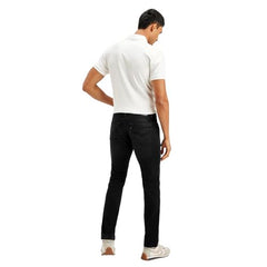 Black Levi's men's slim jeans displayed on a hanger with a classic five-pocket design and subtle stitching details.