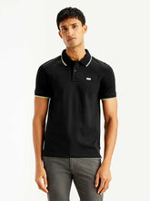 Levi's men's solid slim fit polo T-shirt in a neutral color, showing the front view with a classic collar and short sleeves.