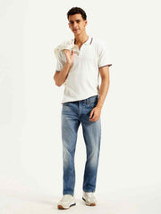 Levi's men's 511 slim fit blue mid-rise jeans, showcasing front view with classic five-pocket design and slim silhouette.