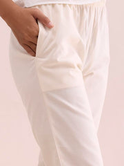 GO COLORS Women Solid Cream Cotton Pencil Pant