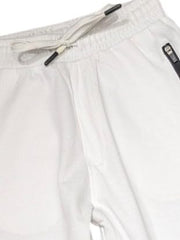 Gini and Jony boys white typography cotton track pants with elastic waistband, suitable for 12-18 months, casual sportswear.