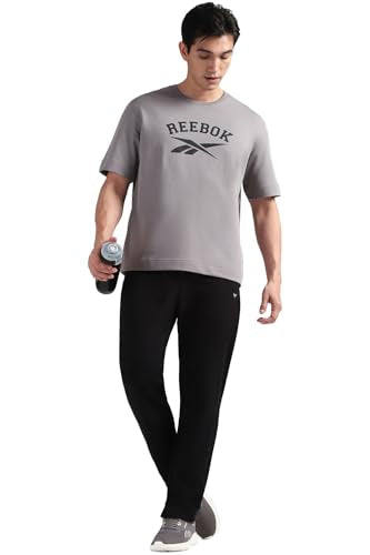 Reebok men's black sports wear pajama pants with elastic waistband and relaxed fit, suitable for lounging or sleep.