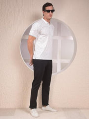 Black Crimsoune Club men's casual trousers with a slim fit, featuring a flat front and side pockets.