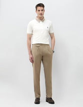 U.S.Polo Association men's solid slim fit polo shirt in classic design, shown on a hanger.