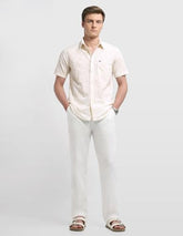 Arrow Sport men's floral printed casual shirt in sage and sun colors, with a button-up front and classic collar.