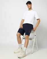 Men's navy embroidered cotton bermuda shorts by Gap, size large, with detailed embroidery and a relaxed fit for casual wear.