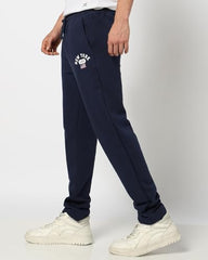 Navy blue Gap men's regular fit mid-rise joggers with elastic waistband and side pockets, made for comfortable sportswear.