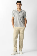 Men's grey print polo neck T-shirt by Van Heusen, featuring a casual fit and long sleeves, displayed on a plain background.