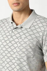 Men's grey print polo neck T-shirt by Van Heusen with long sleeves, casual style, and distinctive print design.