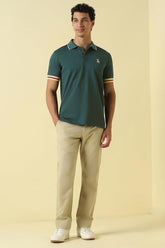 Men Green Solid Polo Neck T-Shirt