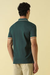 Men Green Solid Polo Neck T-Shirt