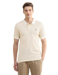 U.S.Polo Association men's tropical printed slim fit polo shirt with short sleeves and vibrant tropical pattern.