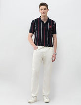 U.S.Polo Association men's navy vertical striped slim fit polo shirt, long sleeve T-shirt, close-up view.