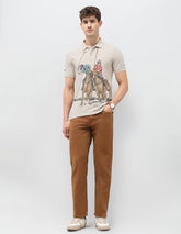 U.S. Polo Assn. Denim Co. men's beige graphic printed muscle fit polo shirt, short sleeve, casual style, front view.