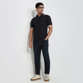 Black Park Avenue men's slim fit cotton polo shirt with half sleeves and straight hem, casual style, solid pattern.