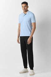 Men's light blue solid polo neck T-shirt by Van Heusen, short sleeve casual upper wear, front view image.