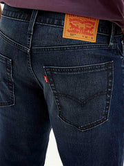 Levis men's jeans in dark wash with detailed stitching and classic five-pocket design, shown from the back in the image.