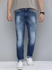 Front view of Levi's men's jeans A7710-0015, classic fit denim pants for men, showing the front pockets and button closure.