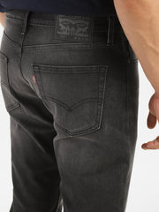 Back view of Levi's men's jeans A7710-0019, showing detailed stitching and classic denim fabric.