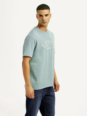 Levis men's long sleeve T-shirt in black, shown from side view, casual fit with crew neck and subtle branding.