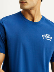 Levi's men's blue crew neck T-shirt with brand logo, short sleeve, casual style, detailed close-up of the fabric and logo.