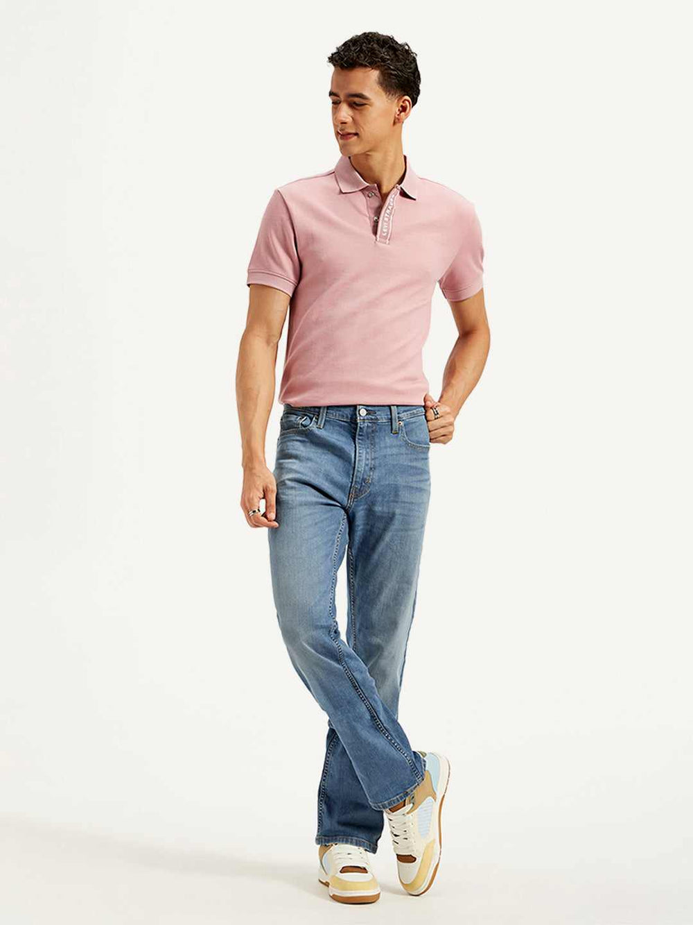 Pair of Levi's men's jeans in classic blue denim, showing the front view with pockets and belt loops.