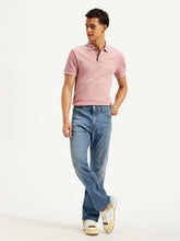Pair of Levi's men's jeans in classic blue denim, showing the front view with pockets and belt loops.