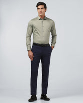 Sage green Blackberry Sylvia non-iron solid men's formal shirt displayed on a hanger.