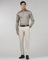 Blackberry men's stone non-iron solid formal shirt, Sylvia model, displayed on a hanger with a classic collar and button front.