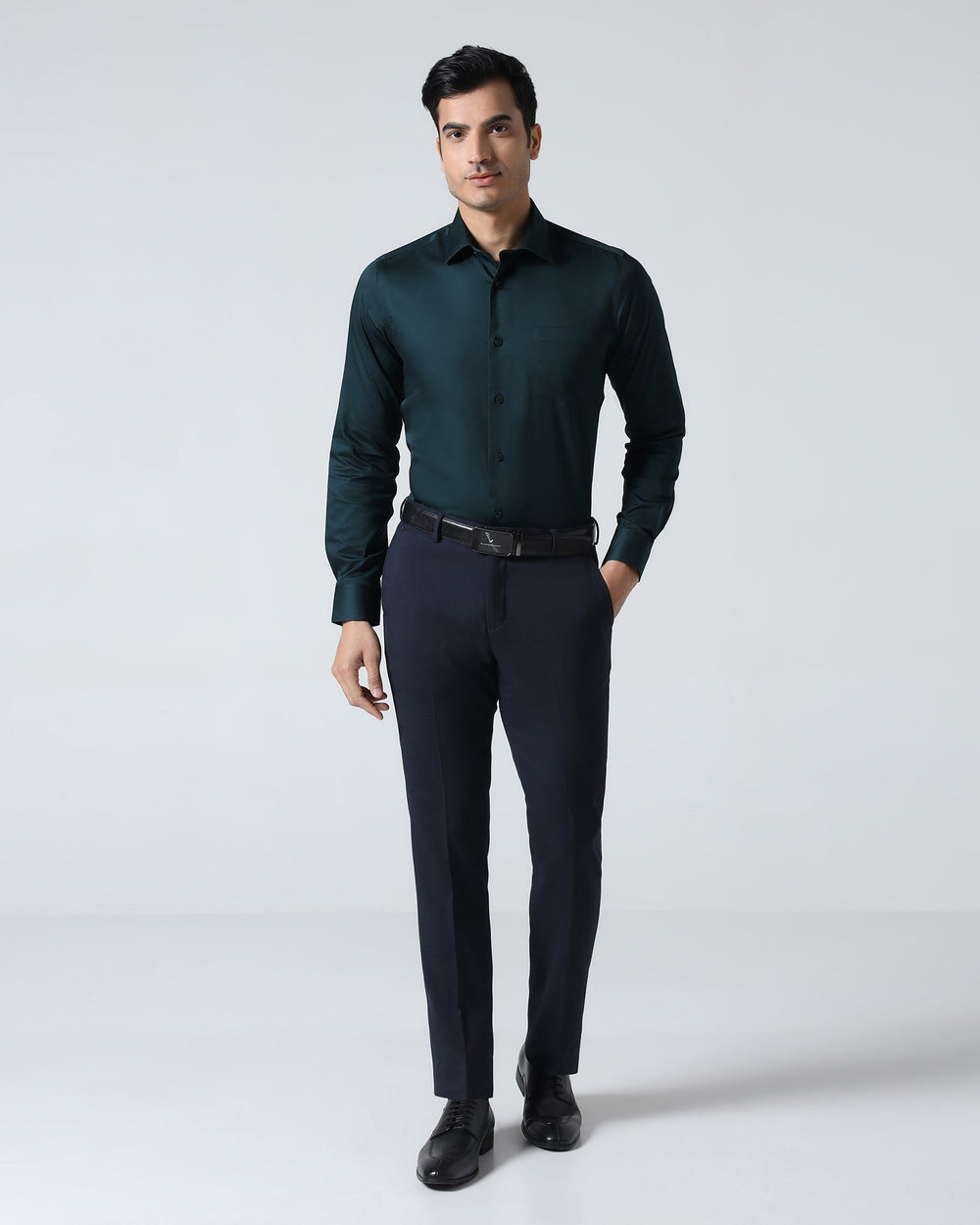 Blackberry men's teal non-iron solid formal shirt, Sylvia style, displayed on a hanger with a crisp collar and smooth fabric.