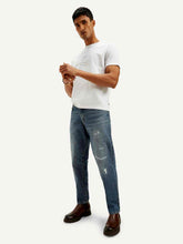 Levi's men's jeans in classic blue denim, featuring a straight fit and five-pocket design.