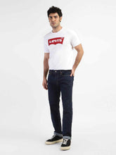 Levis men's jeans style shot showing classic blue denim jeans with a straight fit and five-pocket design.