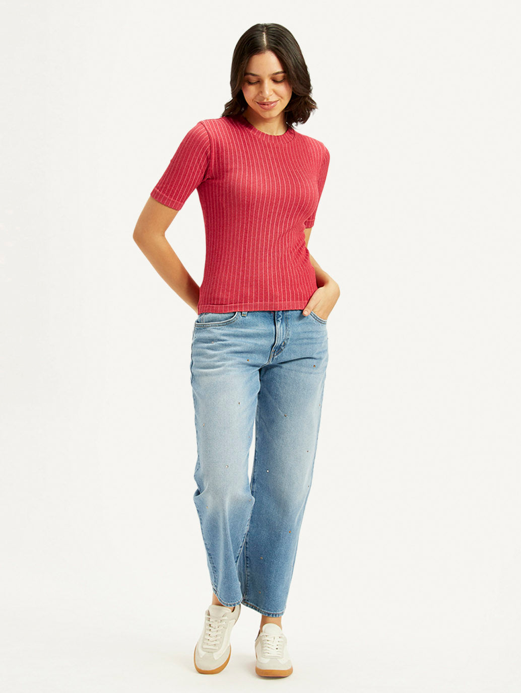 Levis women's solid red crew neck top, stylish winterwear jacket for women, showcasing front view with classic design.