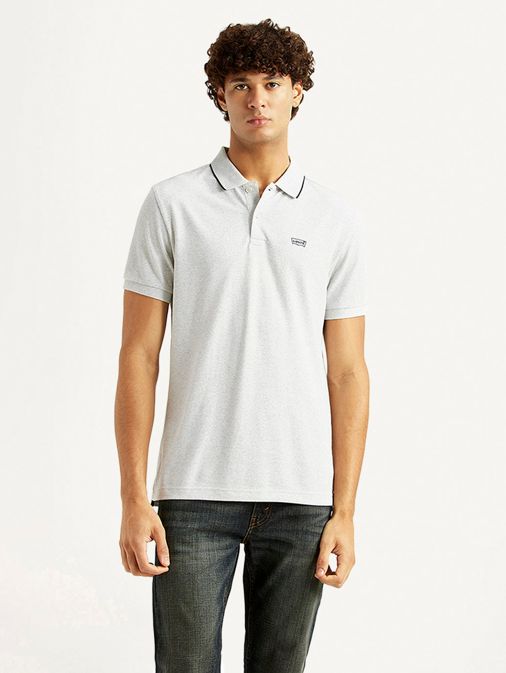 Levi's men's light grey slim fit polo t-shirt with short sleeves, classic collar, and subtle Levi's logo on chest.