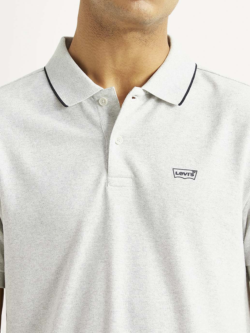 Levi's men's light-grey slim fit polo T-shirt with a collar and short sleeves, displayed on a plain background.