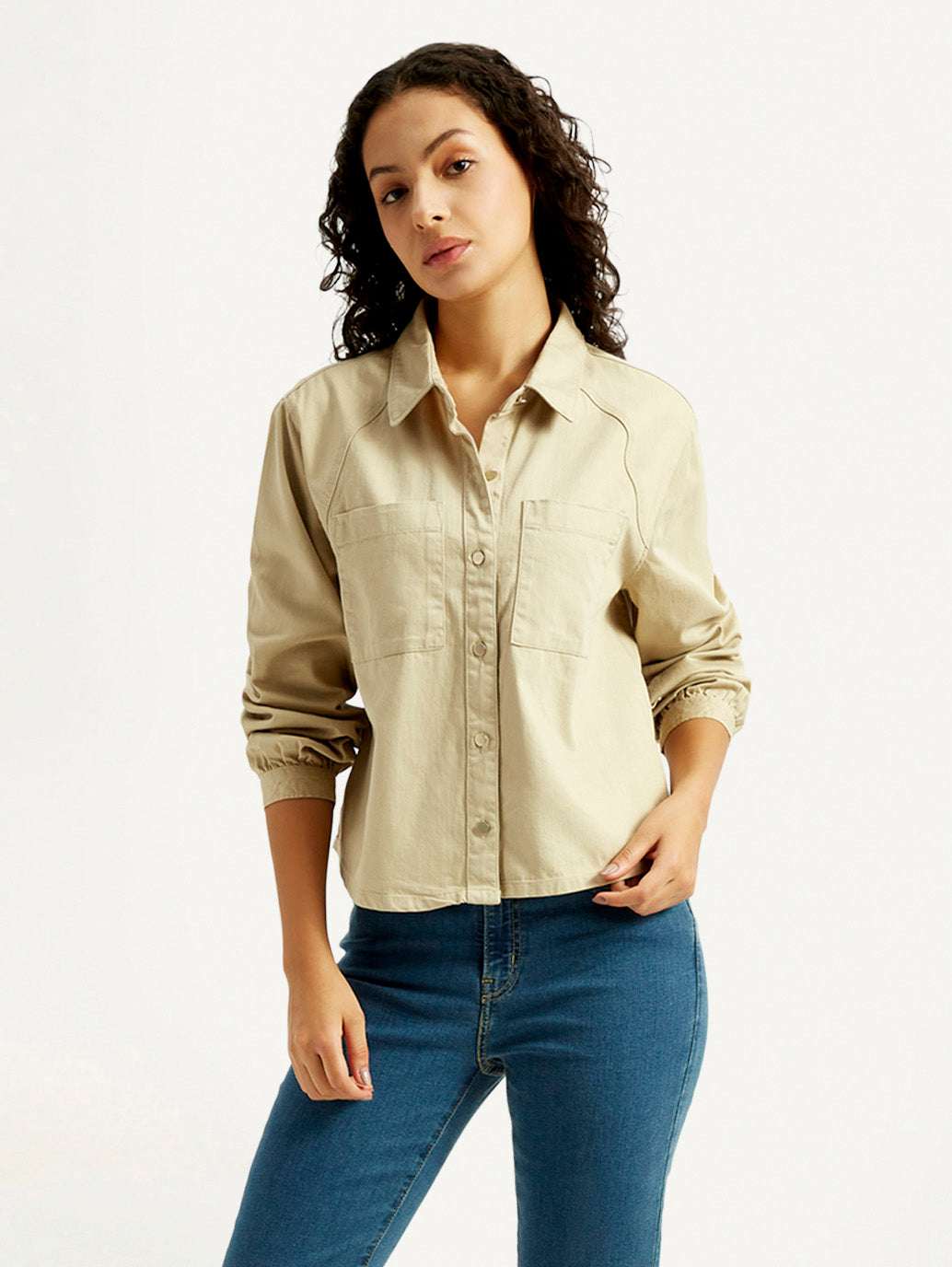 Levi's women's solid denim shirt with spread collar, long sleeves, and classic western style, shown in a styleshot image.